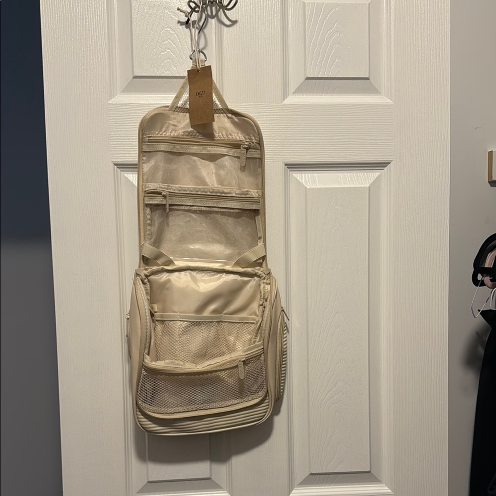 Cream Toiletry Bag with Durable Fabric and Multiple Compartments